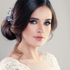 Young Woman Fiancee with Bridal Hairstyle, Natural Makeup and Jewelry