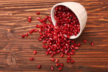 Wall Mural - Bowl with pomegranate seeds