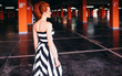 © pyrozenko13 - The elegance lady stands in the corridor