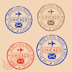 Canvas Print - Collection of CHICAGO postal stamps partially faded on beige paper background