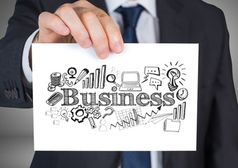 Poster - Businessman holding card with business graphics drawings