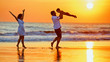 Happy family - father, mother, baby son walk with fun along edge of sunset sea surf on black sand beach. Active parents and people outdoor activity on summer vacations with children on Bali island