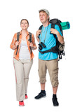 Fototapeta Las - vertical portrait in full length of happy tourists with backpacks on a white background