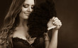 © Voyagerix - Beautiful woman with hand fan.