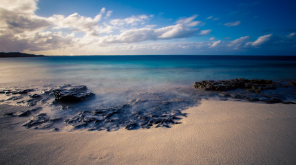 Wall Mural - rocks on grace bay beach 