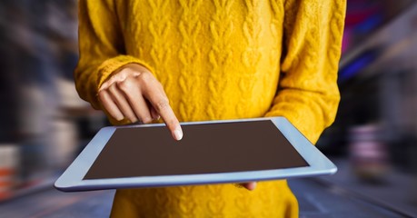 Poster - woman with tablet in the city