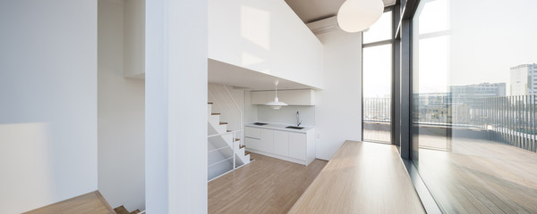 white empty room with kitchen, big window at the day.