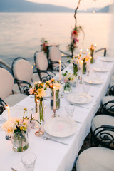 Wall Mural - Wedding dinner by the sea. Wedding banquet at the sea. Donja Lastva, Montenegro, Tivat.