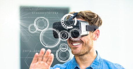 Poster - Digital composite image of smiling man using VR glasses