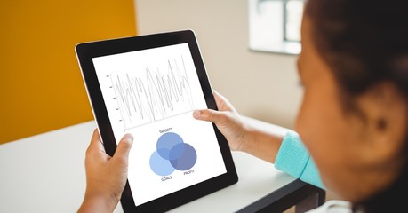Poster - Businesswoman analyzing graphs on tablet PC