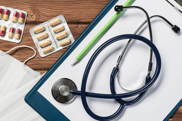 Desk of doctor with medicine things