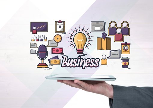 Hand holding tablet with Business text with drawings graphics