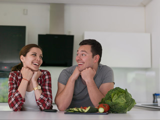 Young couple in the kitchen