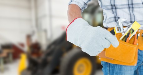 Canvas Print - builder with his tools with blurred background