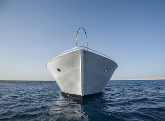 Bow of large motor yacht at sea