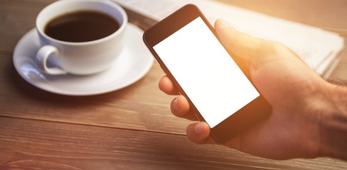 Poster - person showing mobile phone at desk