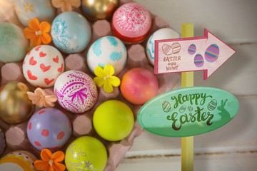 Wall Mural - Composite image of easter egg hunt sign