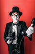 © Nomad_Soul - Mime theater actor performing with old telephone
