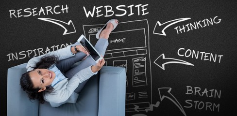 Poster - Composite image of woman on her tablet looking up