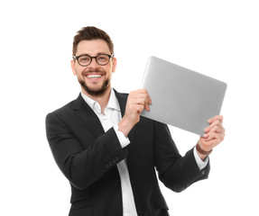 Wall Mural - Handsome young man with laptop on white background