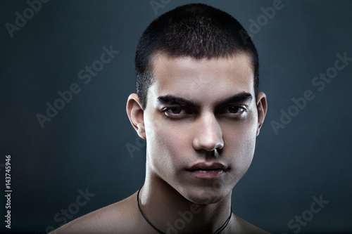Hard Portrait Of Beautiful Young Men With Black Hair And