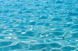 Shining blue water ripple background. Clear sea water background. Photo from Kalamitsi, Sitonia, Halkidiki, Macedonia, Northern Greece.