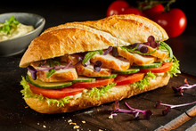 Sliced Chicken Breast And Salad Baguette