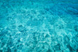 Shining blue water ripple background. Clear sea water background.