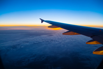 Wall Mural - aerial view from airplane window at sunset