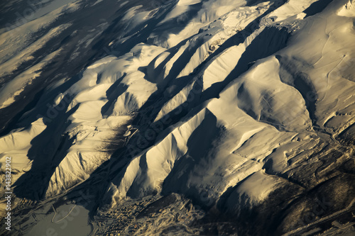 aerial-view-from-air-plane-of-snow-mountains
