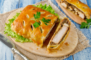 Turkey fillet with mushrooms, baked in puff pastry