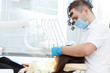 © Nestor - Young woman visiting her dentist