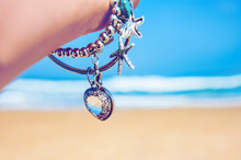 Charm By The Blue Sea. Romantic Bracelet With Pendant Heart-shaped Crystal And Sea Stars.