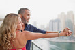 © phocal Media - Couple dancing at balcony.