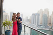 © phocal Media - Couple dancing at balcony.