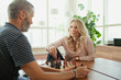 © phocal Media - Couple playing chess.