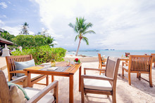 Table Setting. Resort Cafe On The Tropical Sea Beach With Beautiful View.