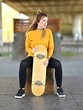 © muro - beautiful girl with skateboard
