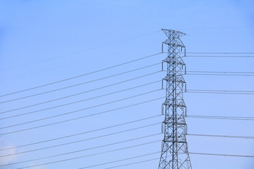 High voltage power pole on  sky background