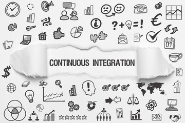 continuous integration / weißes papier mit symbole