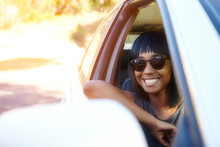 Portrait Of Young Woman, Looking Out Of Car Window