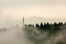 Church, Roana, Altopiano Of Asiago, Province Of Vicenza, Veneto, Italy. Steeple In The Mist.