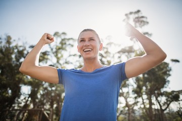 Wall Mural - Fit woman cheering in joy