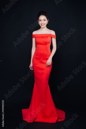 Asian Woman With Fashion Makeup In Luxury Red Dress This Asian Woman With Fashion Makeup In Luxury Red Dress