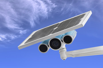 surveillance camera with solar power blue sky as background