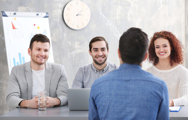 Wall Mural - Human resources commission interviewing man in office