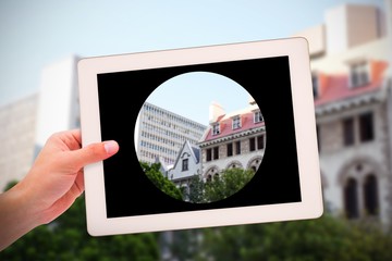 Poster - Composite image of masculine hand holding tablet