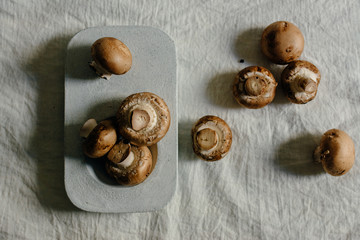 Fresh raw mushrooms, in blue Stone table , portobello variety