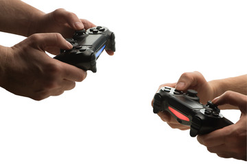 Gamepads in hands isolated on white