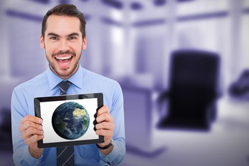 Poster - Composite image of happy businessman showing his tablet pc 